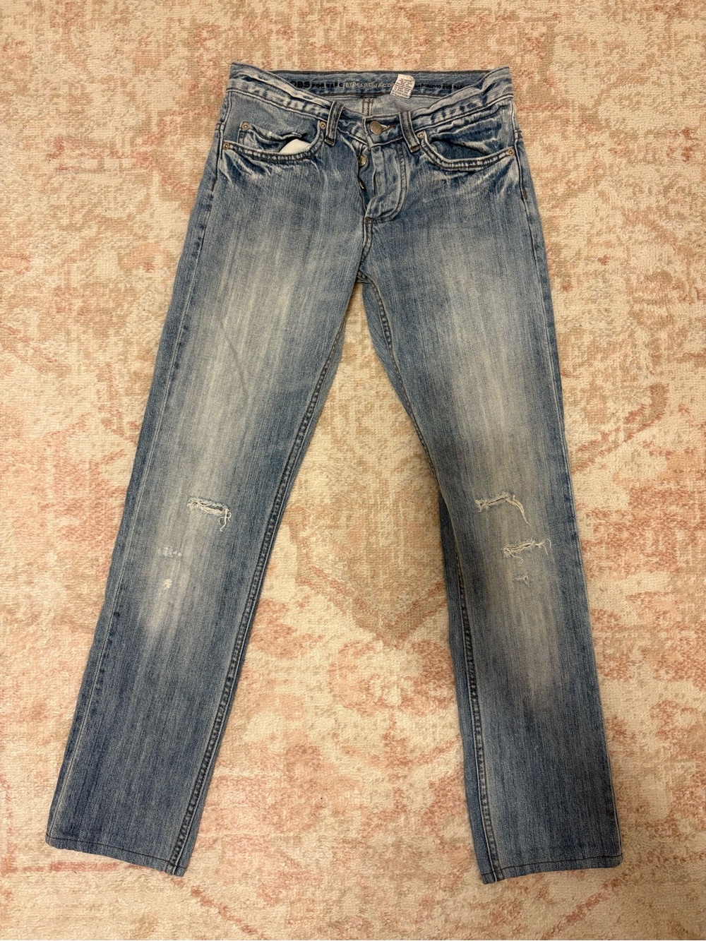 Marc Jacob’s Light Blue Denim Jeans with Metal Button Detail
